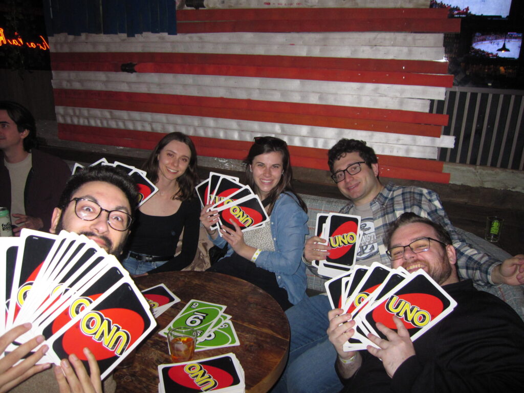 DMCers enjoying a game of UNO at BUG event