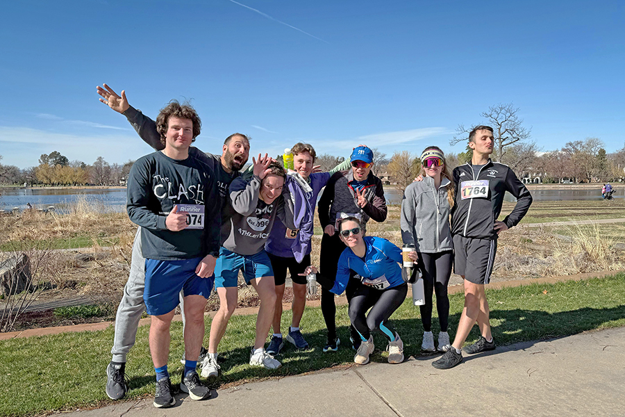 runners pose together outside making wacky faces