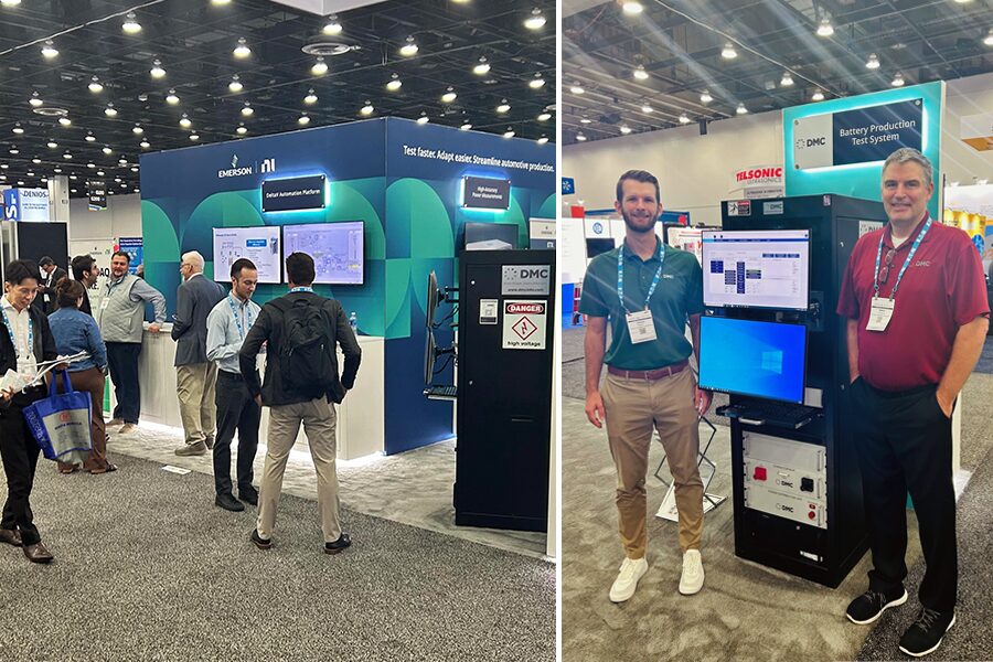 To men standing with a battery test system and people at a trade show booth