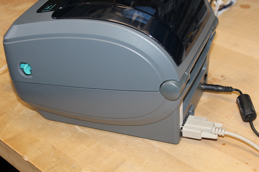 Receipt printer on a wooden table