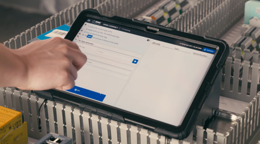 Manufacturing Center Ignition app at a workstation.