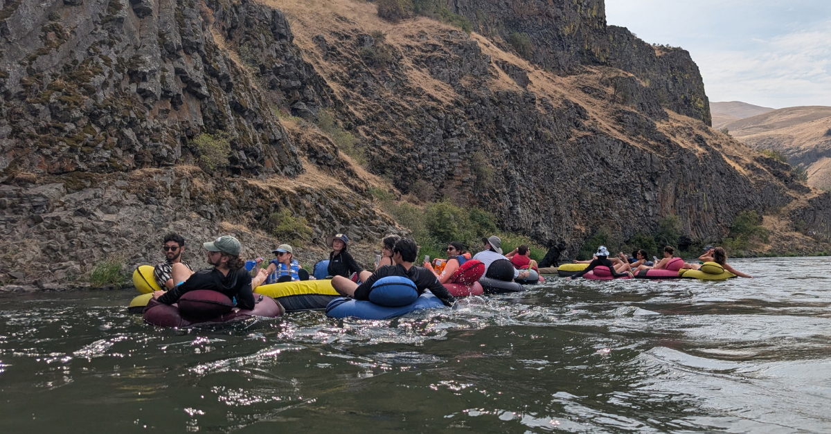 Group of DMC engineers floating in innertubes down the Yakima River