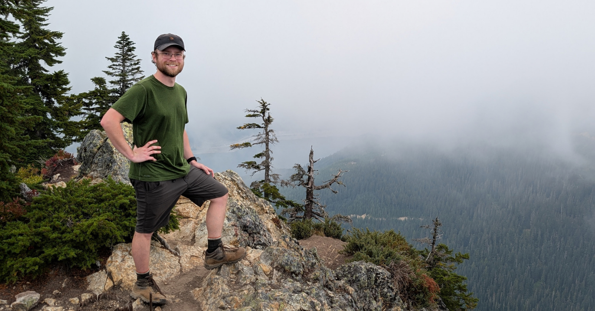 DMC engineer posing on Mount Catherine