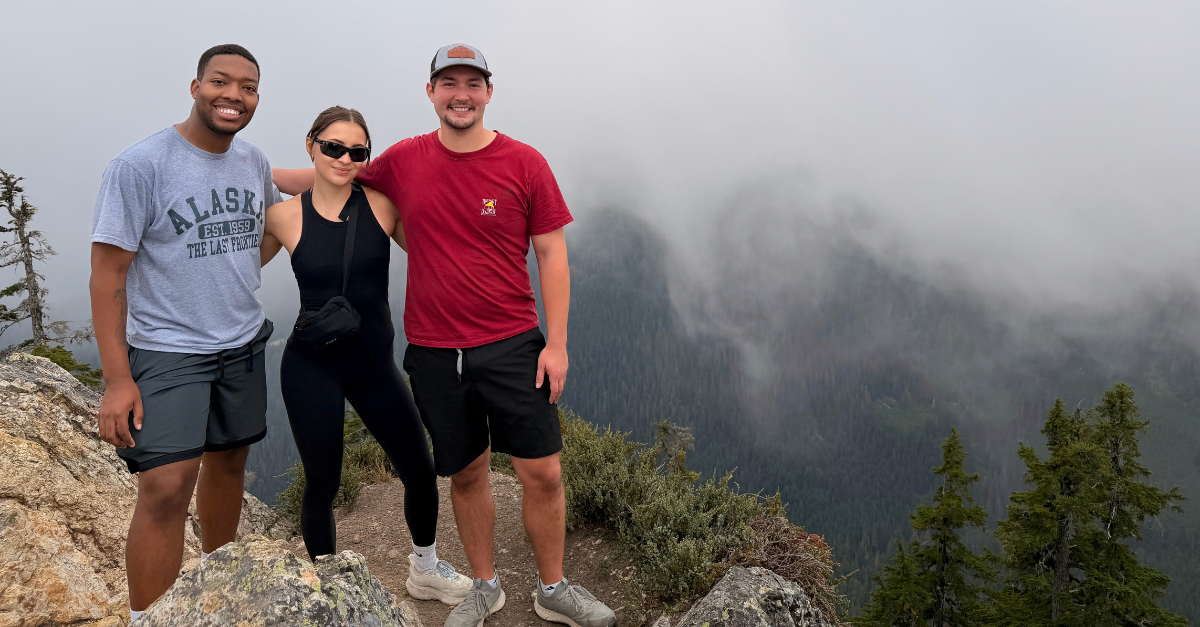 DMC new hires posing on Mount Catherine