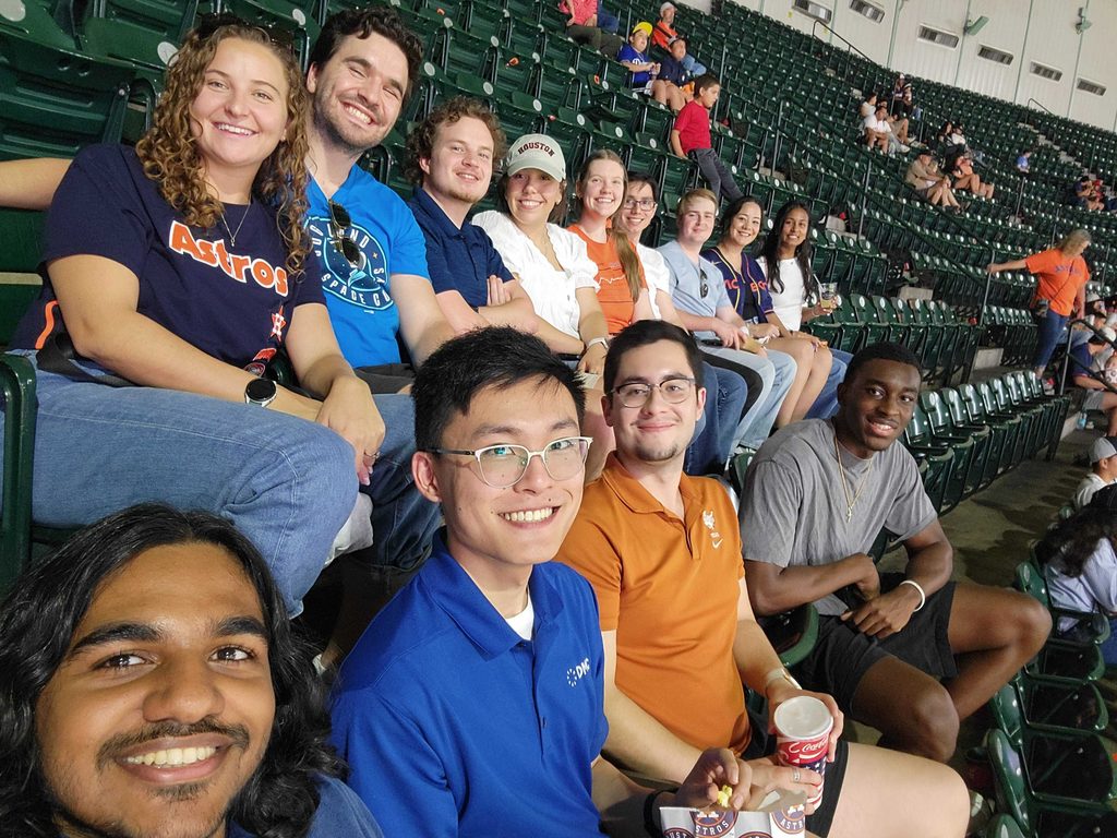 DMC Houston office team members in the stands at Astros game