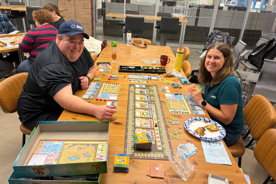 DMC employees playing a board game