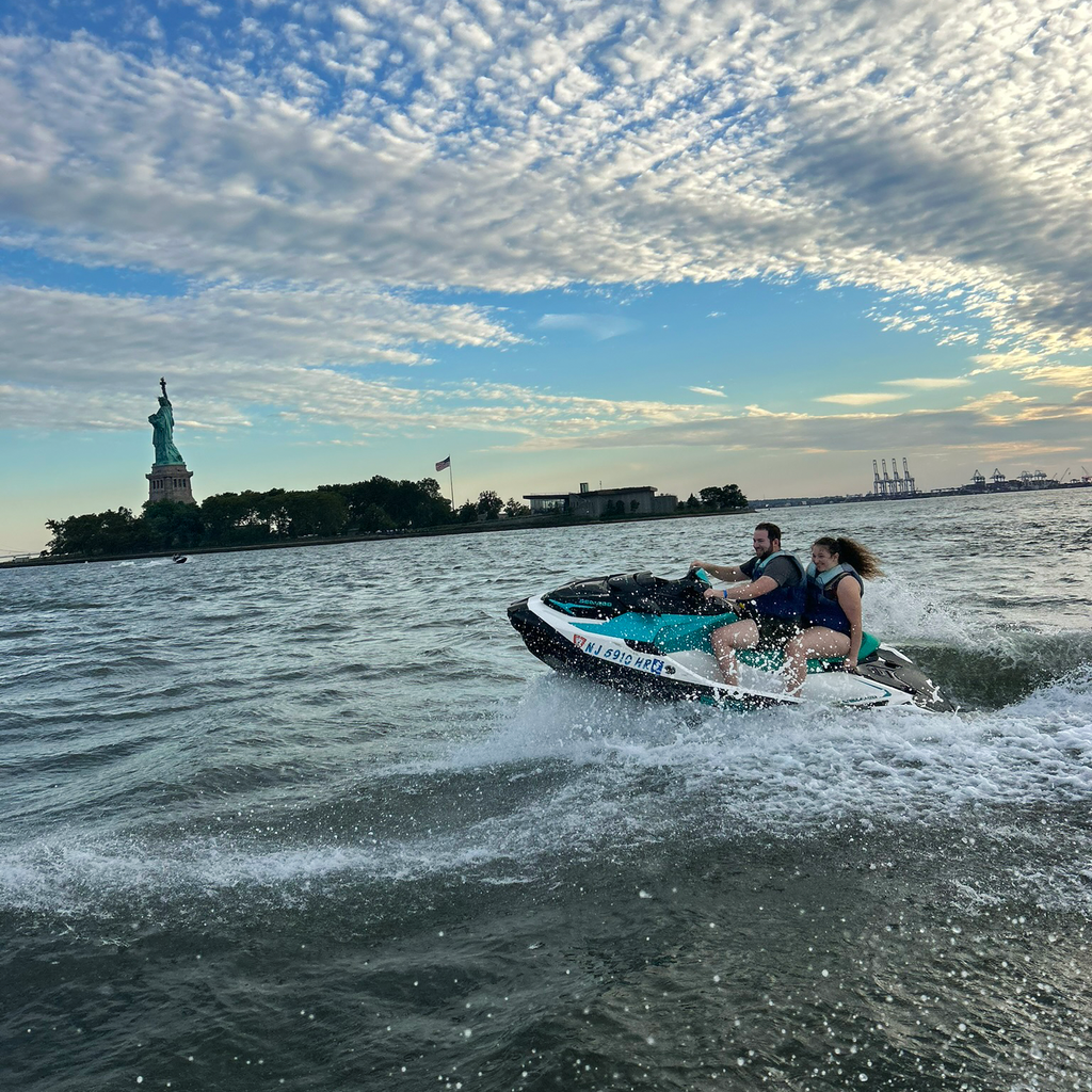 Jet skiing in front of Statue of Liberty